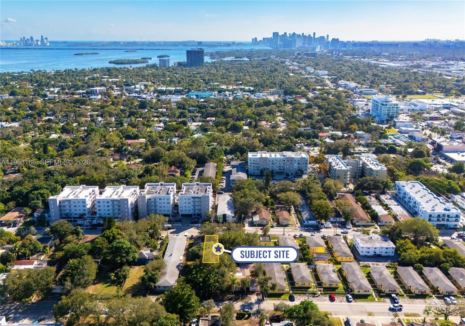 An aerial view shows a highlighted vacant lot surrounded by residential buildings and trees — 729 NE 85th St, Miami FL 33138, MIAMI, FL