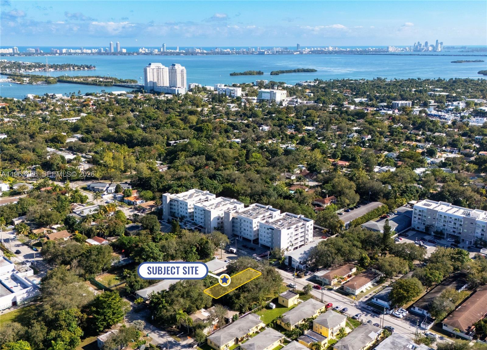 An aerial view shows a rectangular lot highlighted in yellow amidst a suburban neighborhood — 729 NE 85th St, Miami FL 33138, MIAMI, FL