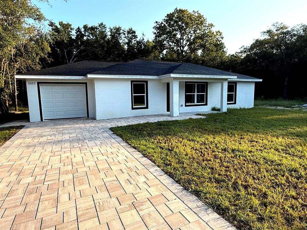 5557 NW 16TH PLACE