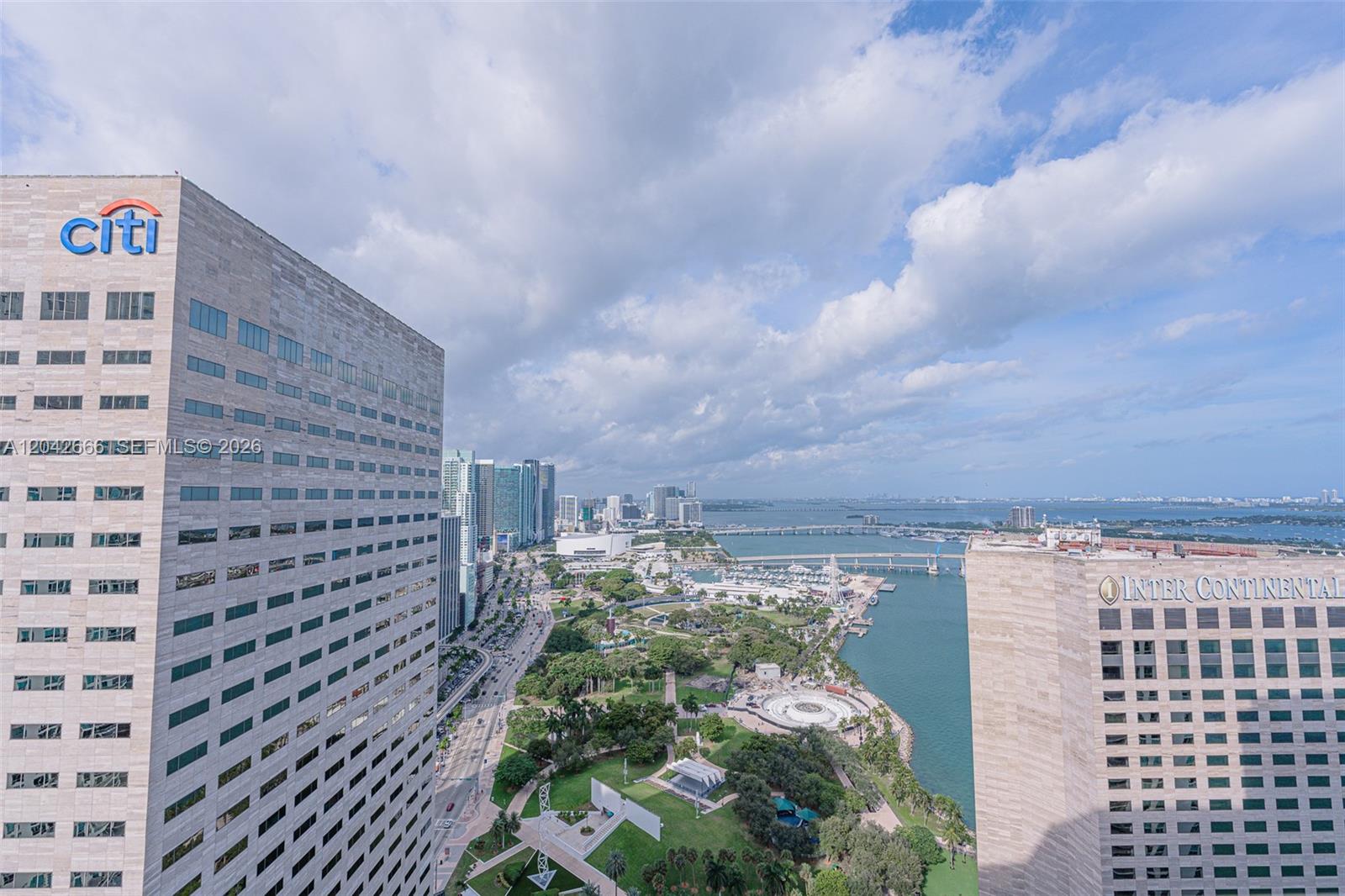 An elevated view shows the Citi and InterContinental buildings flanking a park and bay — 325 S BISCAYNE BLVD # 4222, Miami FL 33131, MIAMI, FL