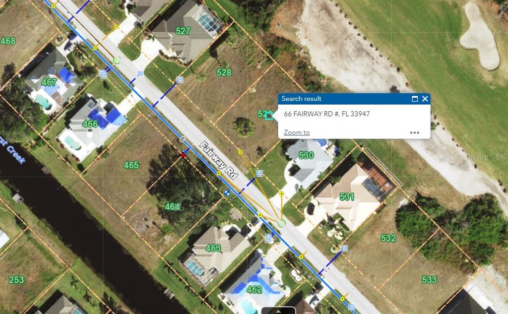 This is an aerial map showing residential lots and houses along a street — 66 FAIRWAY ROAD, ROTONDA WEST, FL