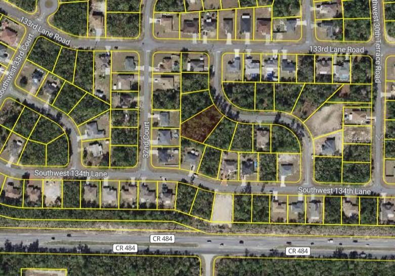 This is an aerial map showing a vacant residential lot highlighted within a suburban neighborhood — SW 31ST TERRACE ROAD, OCALA, FL