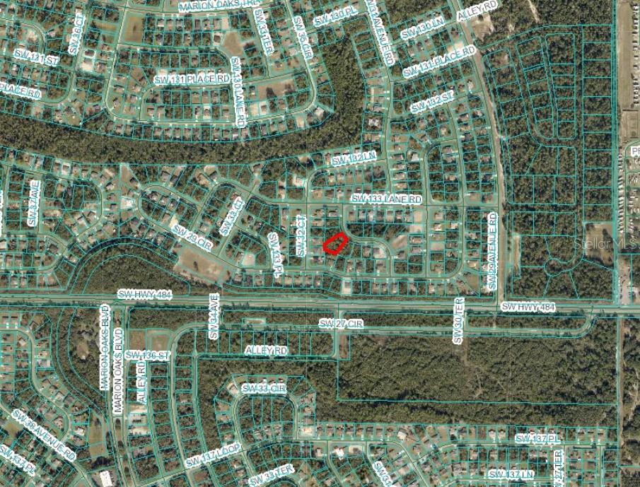 This is an aerial map showing a residential neighborhood with a highlighted property lot — SW 31ST TERRACE ROAD, OCALA, FL