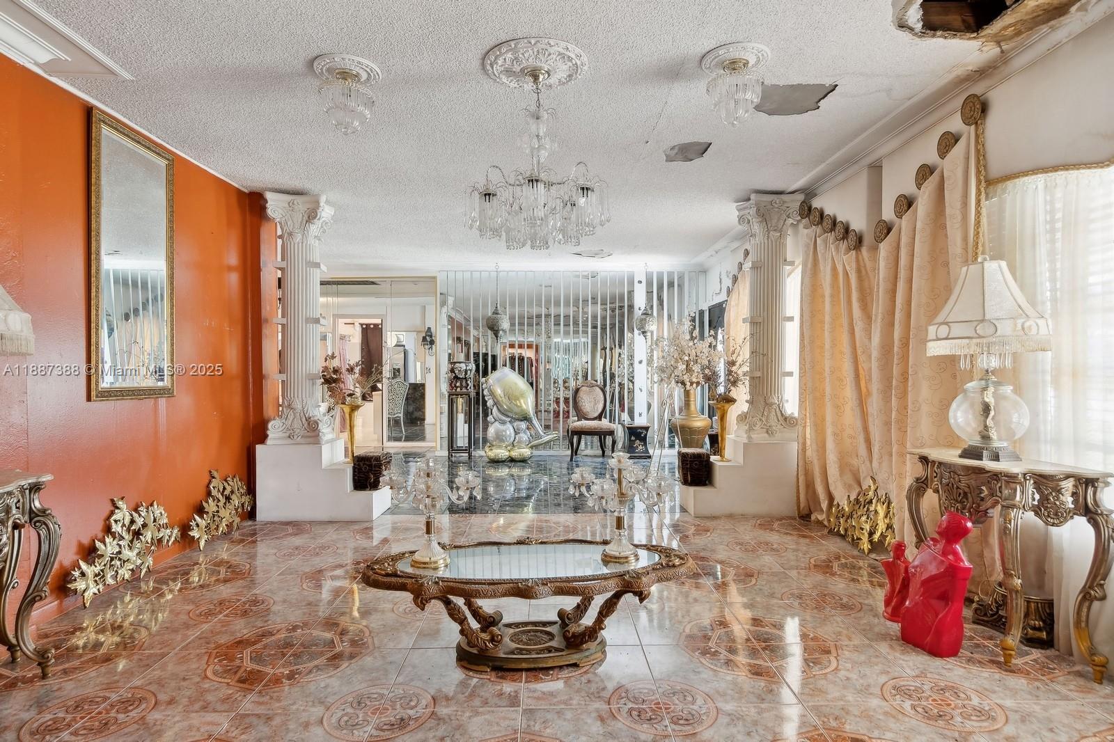 A living room features ornate furniture, classical columns, mirrored walls, and a damaged popcorn ceiling — 469 NW 69th St, Miami FL 33150, MIAMI, FL