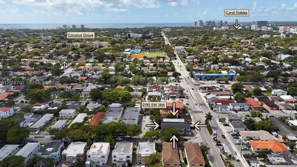 An aerial view shows a multi-unit residential building located along a busy city street — 2190 SW 14th Ter, Miami FL 33145, MIAMI, FL