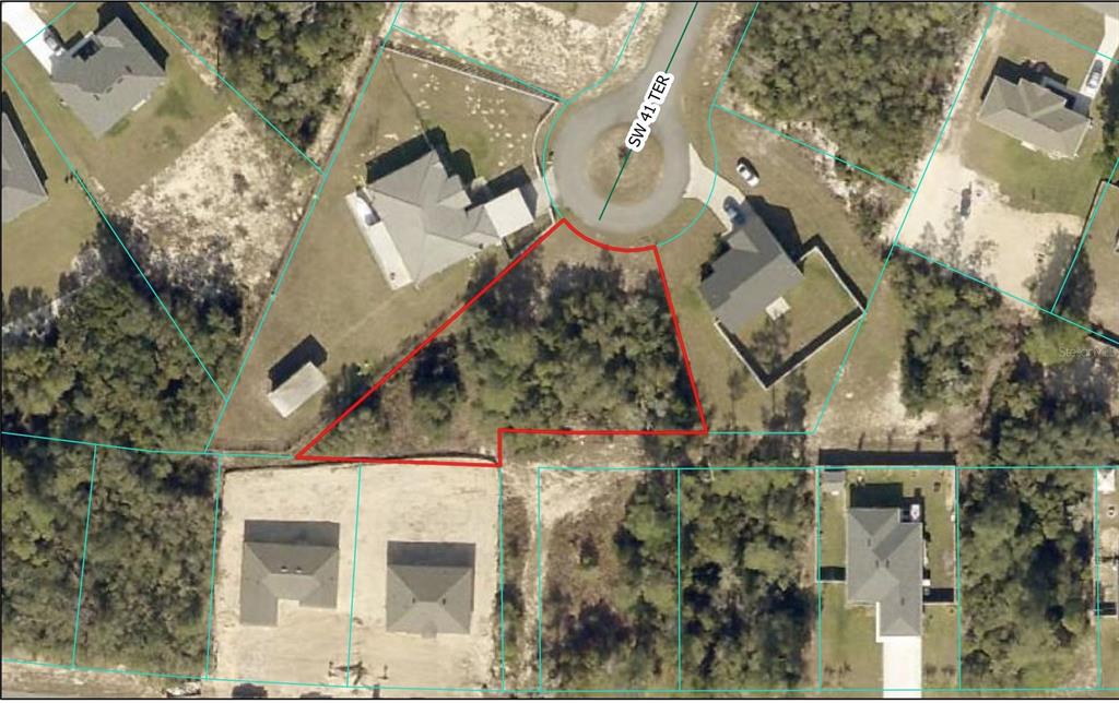 An aerial view shows a vacant, wooded residential lot outlined in red within a cul-de-sac — TBD SW 41ST TERRACE, OCALA, FL