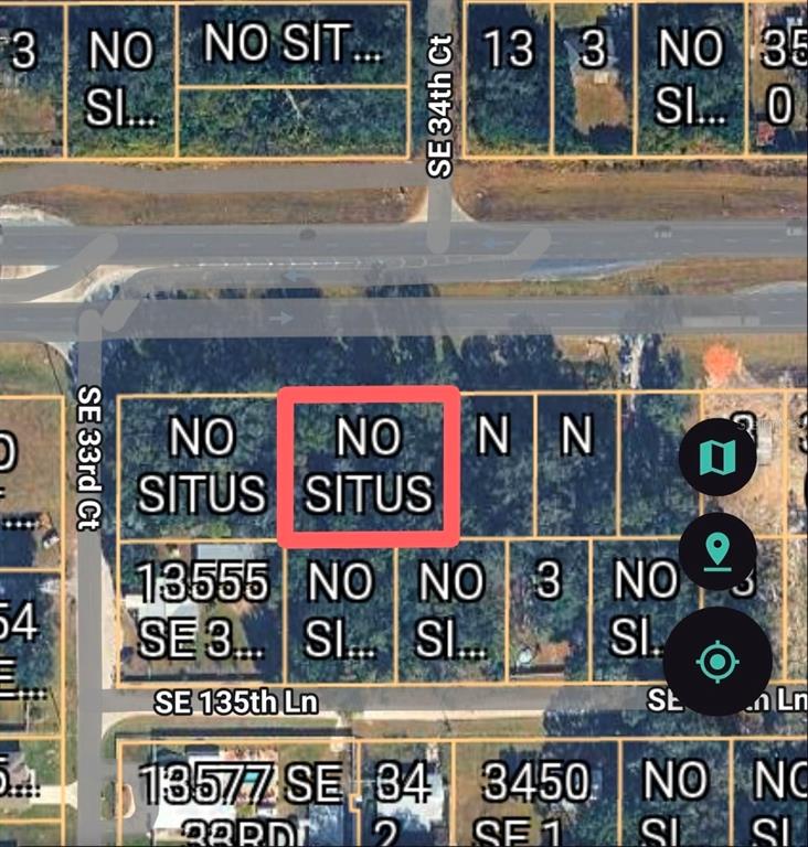 This is a satellite map view showing a highlighted vacant residential lot — 00 SE HWY 484, SUMMERFIELD, FL