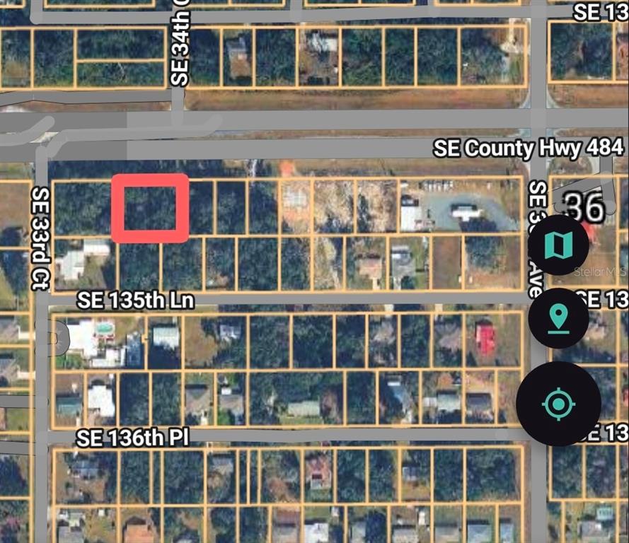 This is a satellite map view showing a highlighted rectangular plot of land — 00 SE HWY 484, SUMMERFIELD, FL