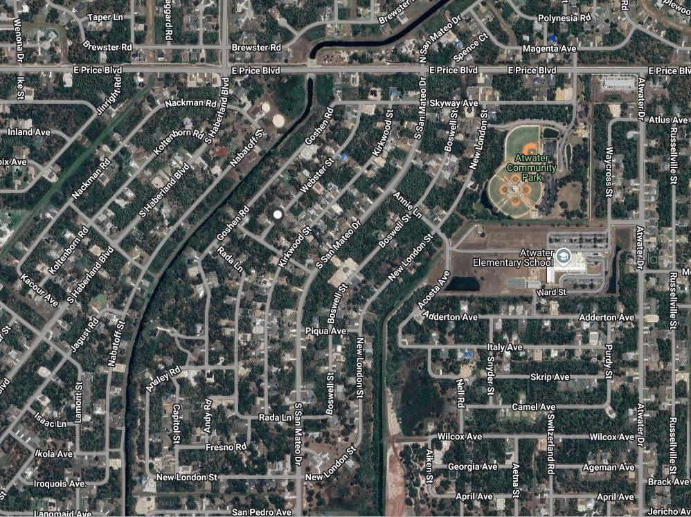 This is an aerial map view of a residential neighborhood featuring a park and school — WEBSTER STREET, NORTH PORT, FL