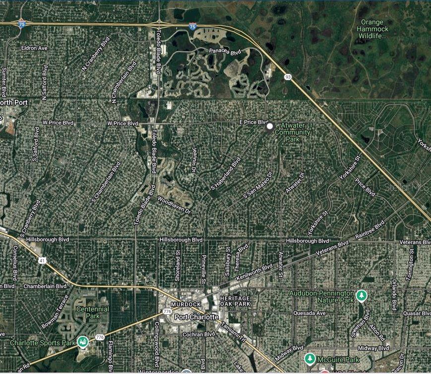 This is a satellite map view of a residential area in Port Charlotte, Florida — WEBSTER STREET, NORTH PORT, FL