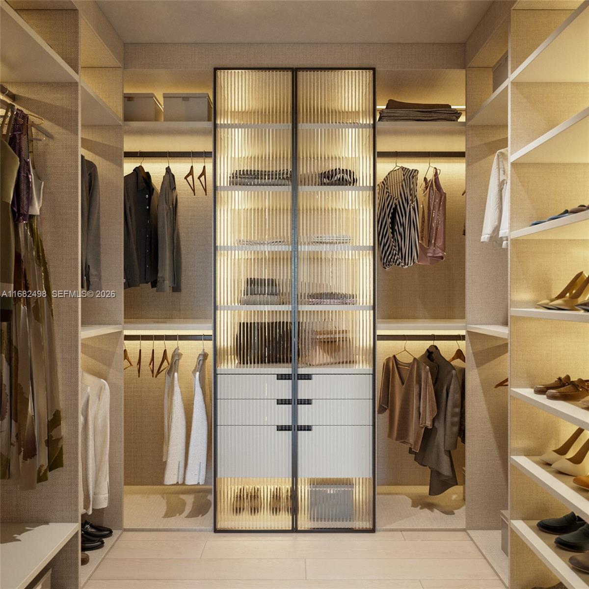 This is a rendering of a modern walk-in closet with illuminated glass-front cabinetry and shelving — 3724 S OCEAN DR # 607, Hollywood FL 33019, HOLLYWOOD, FL