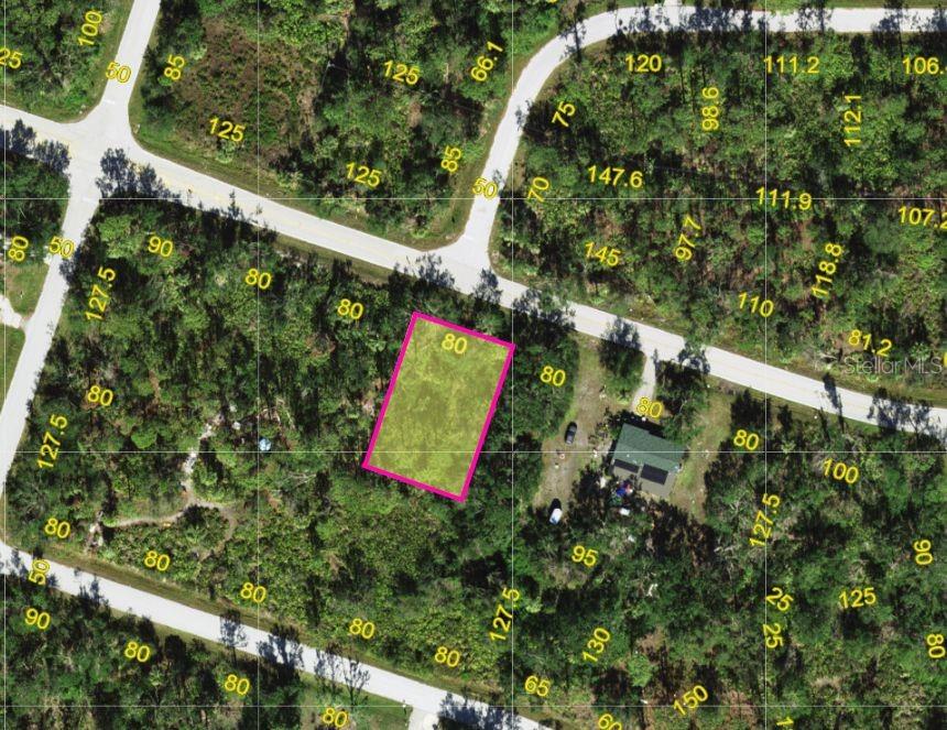 An aerial map view shows a rectangular plot of land highlighted in pink — 23341 ELMIRA BOULEVARD, PUNTA GORDA, FL