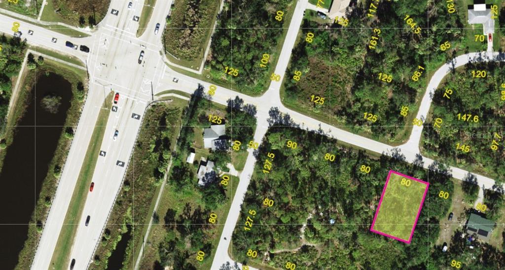 An aerial map view shows a rectangular plot of land highlighted in pink — 23341 ELMIRA BOULEVARD, PUNTA GORDA, FL