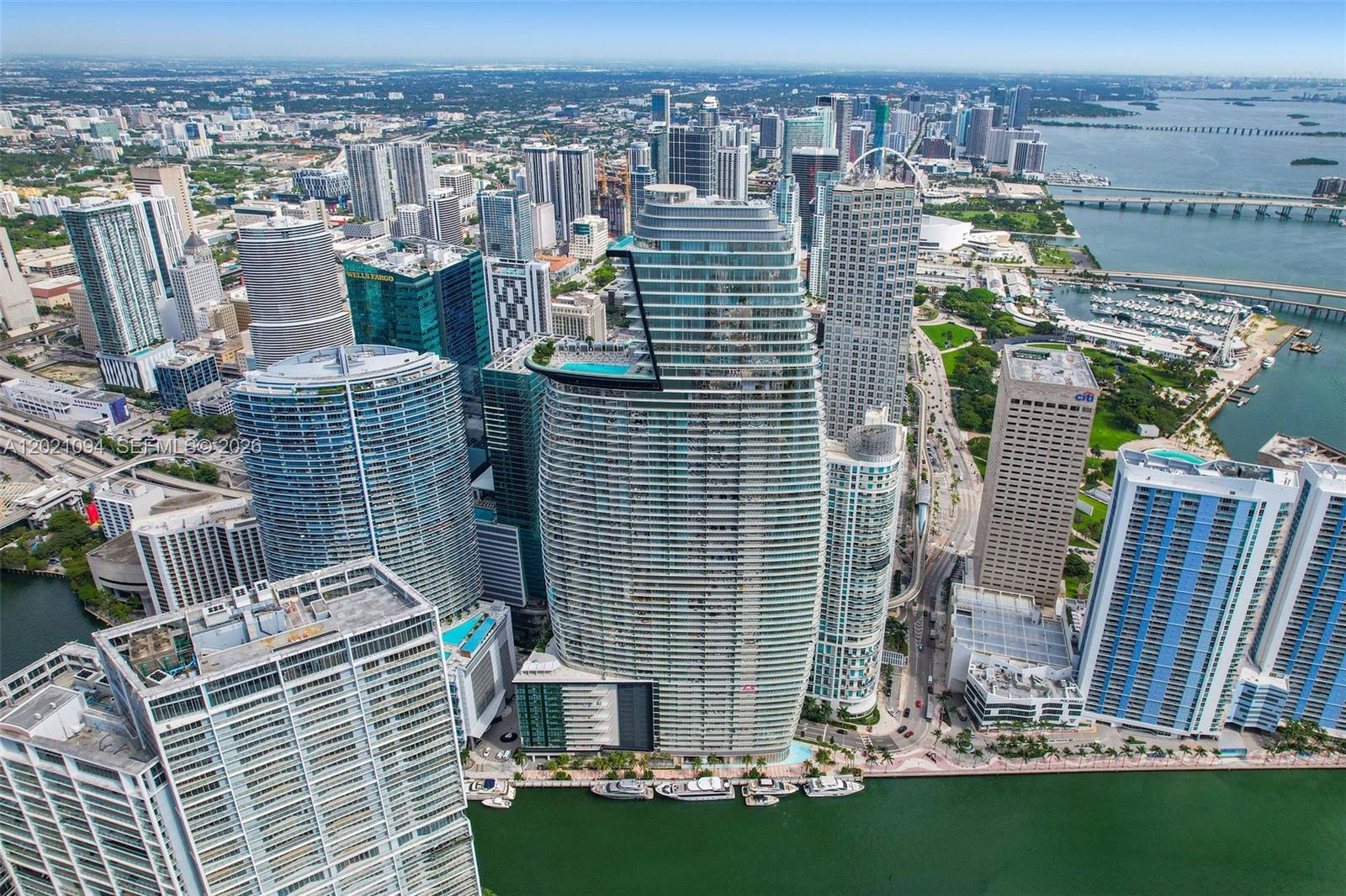 An aerial view of the Miami skyline featuring the curved One Thousand Museum skyscraper — 300 Biscayne Blvd Way # 3404C, Miami FL 33131, MIAMI, FL