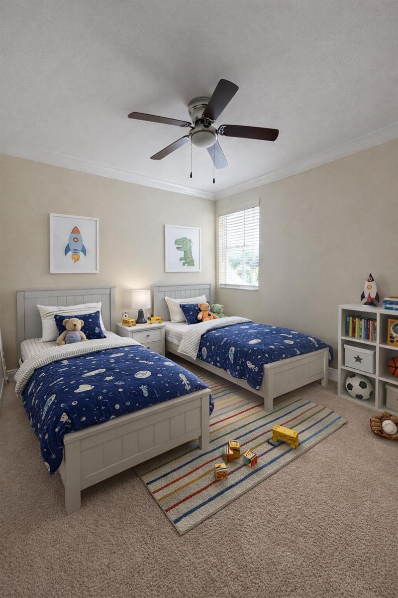 A children's bedroom features two twin beds with space-themed bedding and a striped area rug — 2837 N Course Drive # 202, Pompano Beach FL 33069, POMPANO BEACH, FL
