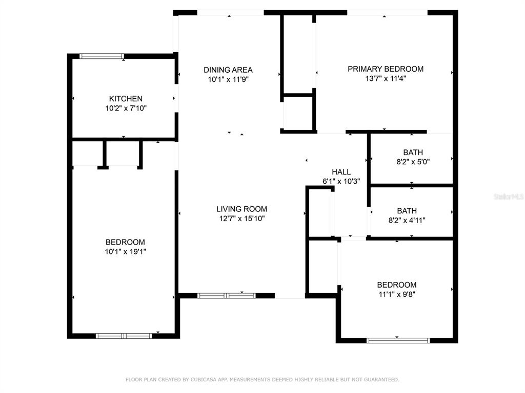 This is a floor plan showing a three-bedroom, two-bathroom residential layout — 1726 TROPICAL COURT, TAVARES, FL