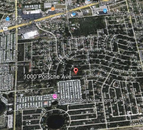 This is an aerial map view showing a residential area with a red location pin — 1000 PORCHE, Sebring FL 33872, SEBRING, FL