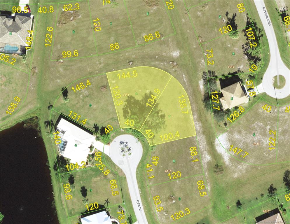 This is a satellite map showing property lot lines and dimensions for a residential area — 17172 SPICE LANE, PUNTA GORDA, FL