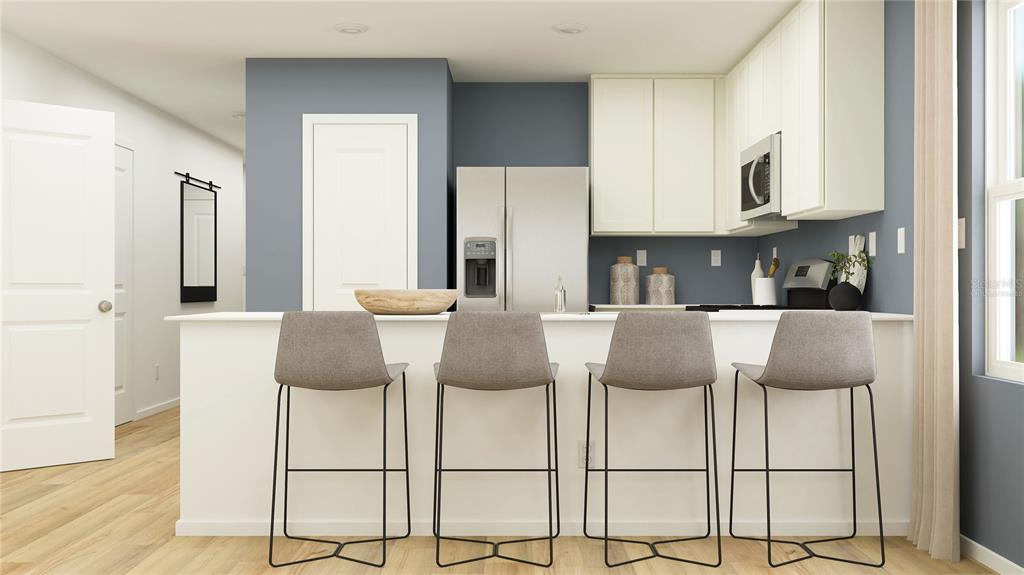 This is a digital rendering of a kitchen featuring a breakfast bar with four stools — 2408 BEVEL LANE, DAVENPORT, FL