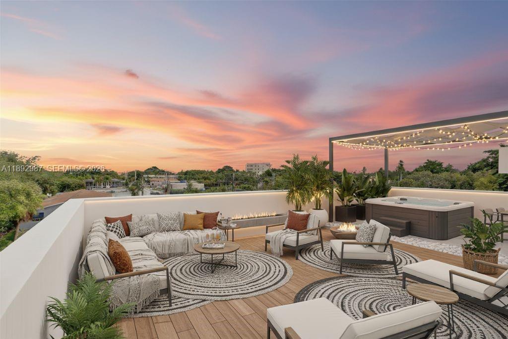 This rendering shows a rooftop terrace with a sectional sofa, lounge chairs, and a hot tub — 527 NE 61st St, Miami FL 33137, MIAMI, FL