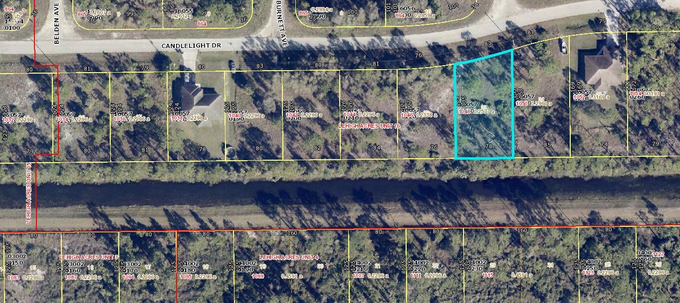 This is a satellite map showing residential property lot lines in a suburban neighborhood — 1048 Candlelight Drive, Lehigh Acres FL 33974, LEHIGH ACRES, FL