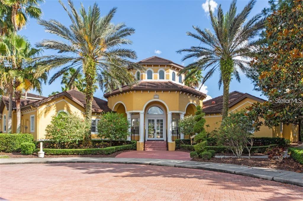 A stone-paved entrance features a sign for Las Palmas Luxury Condominiums with white columns — 5655 BENTGRASS DRIVE UNIT 9-111, SARASOTA, FL