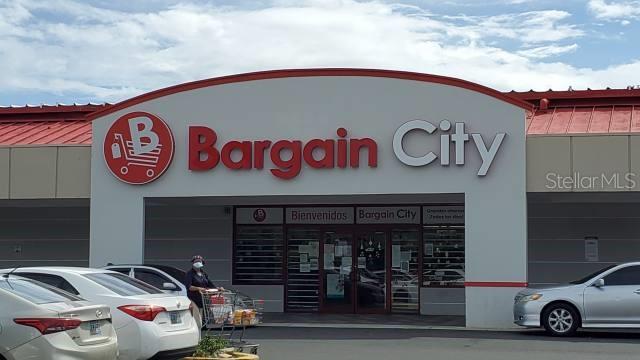 The exterior of a Bargain City store features a red-and-white sign above the entrance — PR 3 KM 82.5, HUMACAO, PR