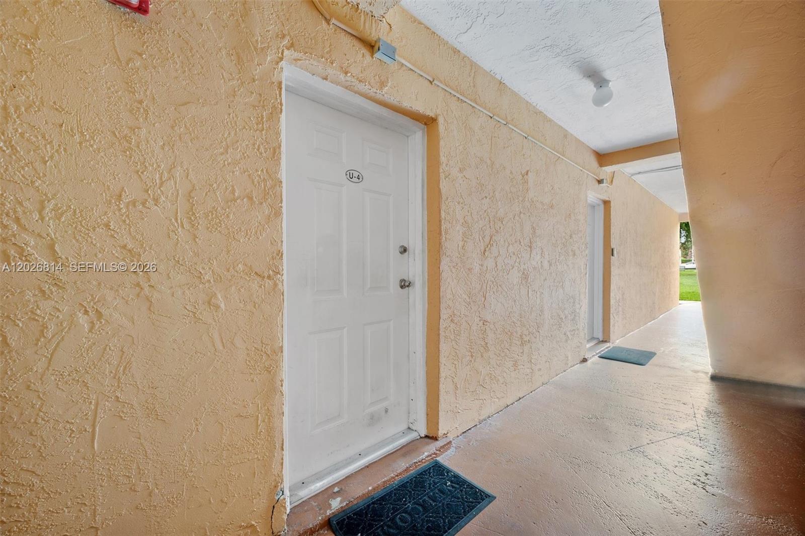 A kitchen with light wood cabinets, stainless steel appliances, and tile flooring — 9445 SW 76th St # U4, Miami FL 33173, MIAMI, FL