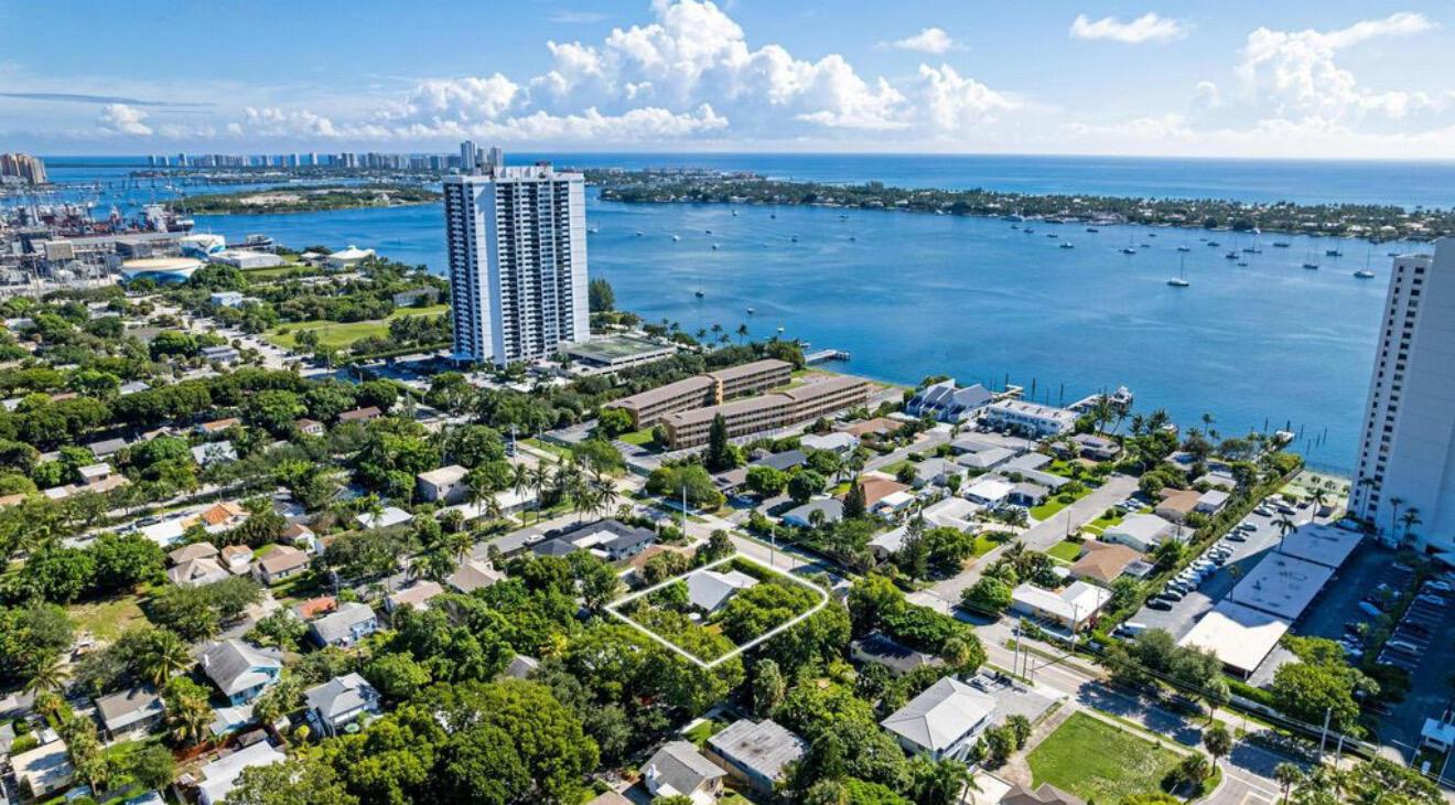 An aerial view shows a residential neighborhood with a highlighted house near a coastal waterway — 5301 N Flagler Drive, West Palm Beach FL 33407, WEST PALM BEACH, FL