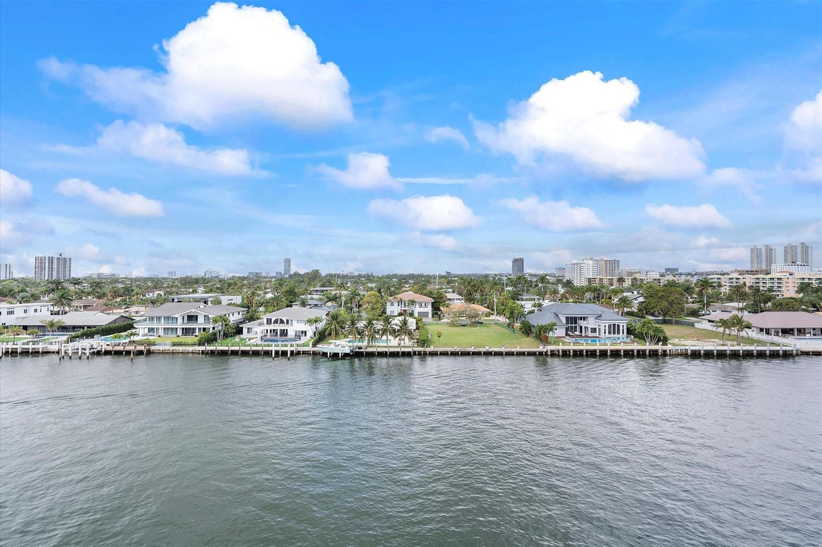 An aerial view of waterfront luxury homes with private docks along a canal — 2017 S Ocean Drive # 710, Hallandale Beach FL 33009, HALLANDALE BEACH, FL