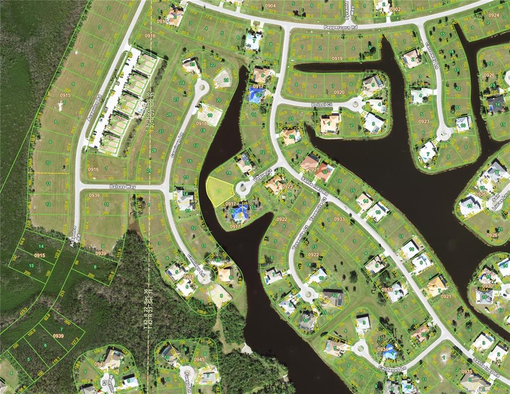 This is a satellite map view of a residential neighborhood with houses and winding streets — 17333 VOGUE COURT, PUNTA GORDA, FL