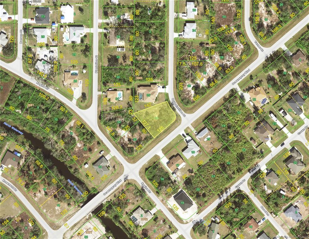 This is an aerial map showing residential lots and streets in a suburban neighborhood — 11148 OCEANSPRAY BOULEVARD, ENGLEWOOD, FL