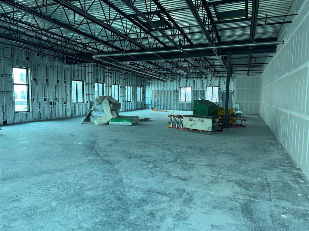 This is a building lifesafety and dimension floor plan for a medical spa facility — 6355 INITIATIVE BOULEVARD UNIT 110, SARASOTA, FL