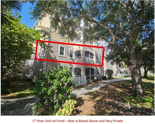 A multi-story apartment building exterior with a red rectangle highlighting a specific unit — 3446 SOHO STREET UNIT 108, ORLANDO, FL