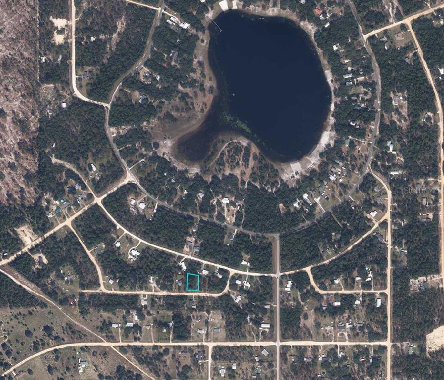 An aerial map view shows a rectangular property lot highlighted in blue near a lake — 5814 HILLRIDGE ROAD, KEYSTONE HEIGHTS, FL