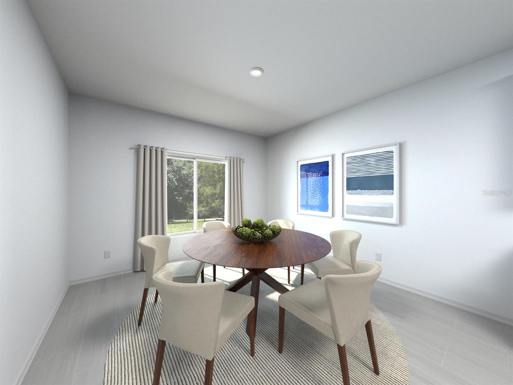 This is a digital rendering of a dining room featuring a round wooden table — 1697 COOLRIDGE PLACE, ZEPHYRHILLS, FL