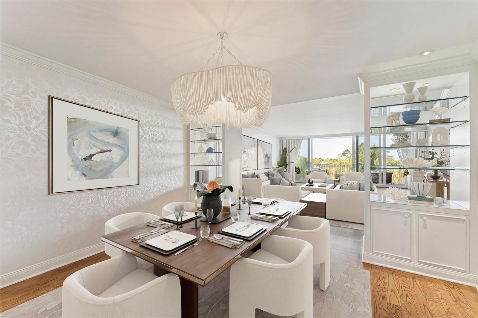 A dining room with a dark wood table, white chairs, and a large beaded chandelier — 100 Royal Palm Way # G5, Palm Beach FL 33480, PALM BEACH, FL