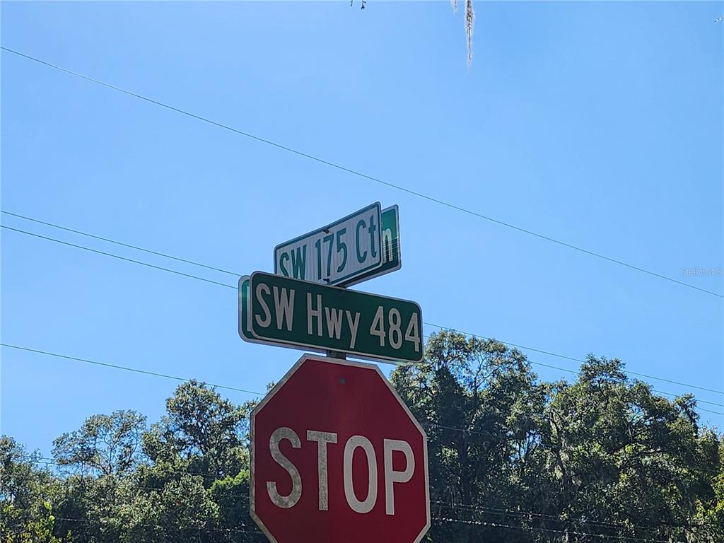 A stop sign stands below street signs for SW 175 Cth and SW Hwy 484 — TBD SW 175 COURT, DUNNELLON, FL