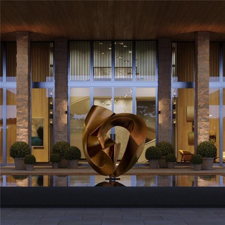 This architectural rendering shows a modern building entrance featuring a large bronze sculpture and reflecting pool — 1000 BENJAMIN FRANKLIN DRIVE UNIT 404, SARASOTA, FL