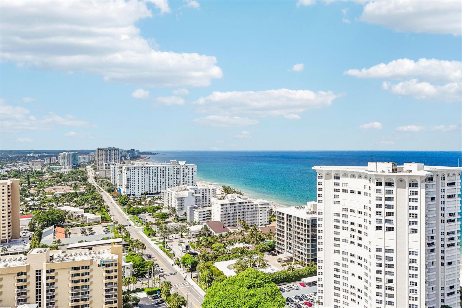 An elevated view of a coastal city featuring high-rise buildings, a beach, and the ocean — 1340 S Ocean Boulevard # 2303, Pompano Beach FL 33062, POMPANO BEACH, FL