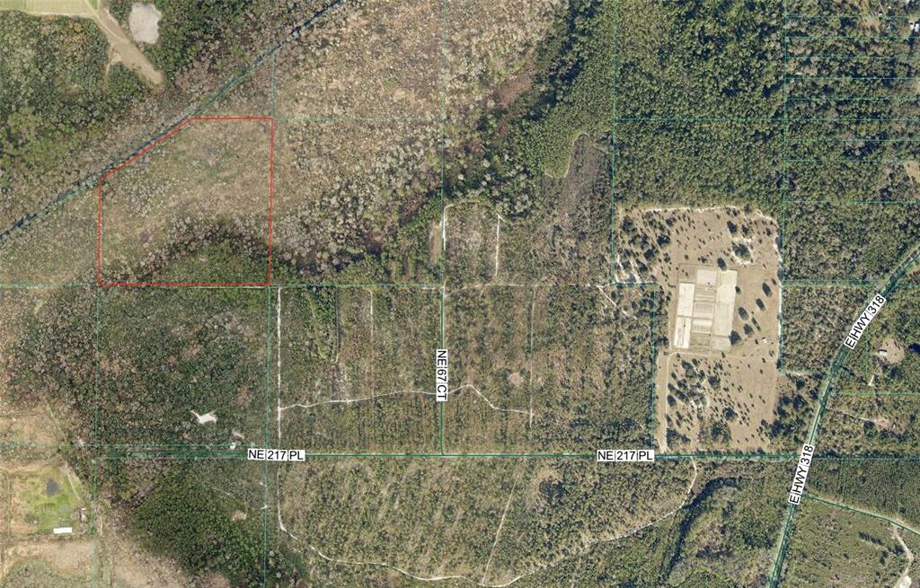 This is an aerial map showing a plot of land outlined in red — 0 NE 217TH PL, CITRA, FL