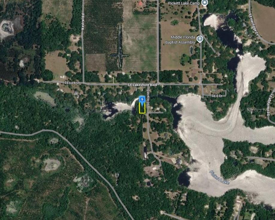 This is an aerial map showing a property highlighted in yellow near Picket Lake — 160 SE ISLAND DRIVE, BRANFORD, FL