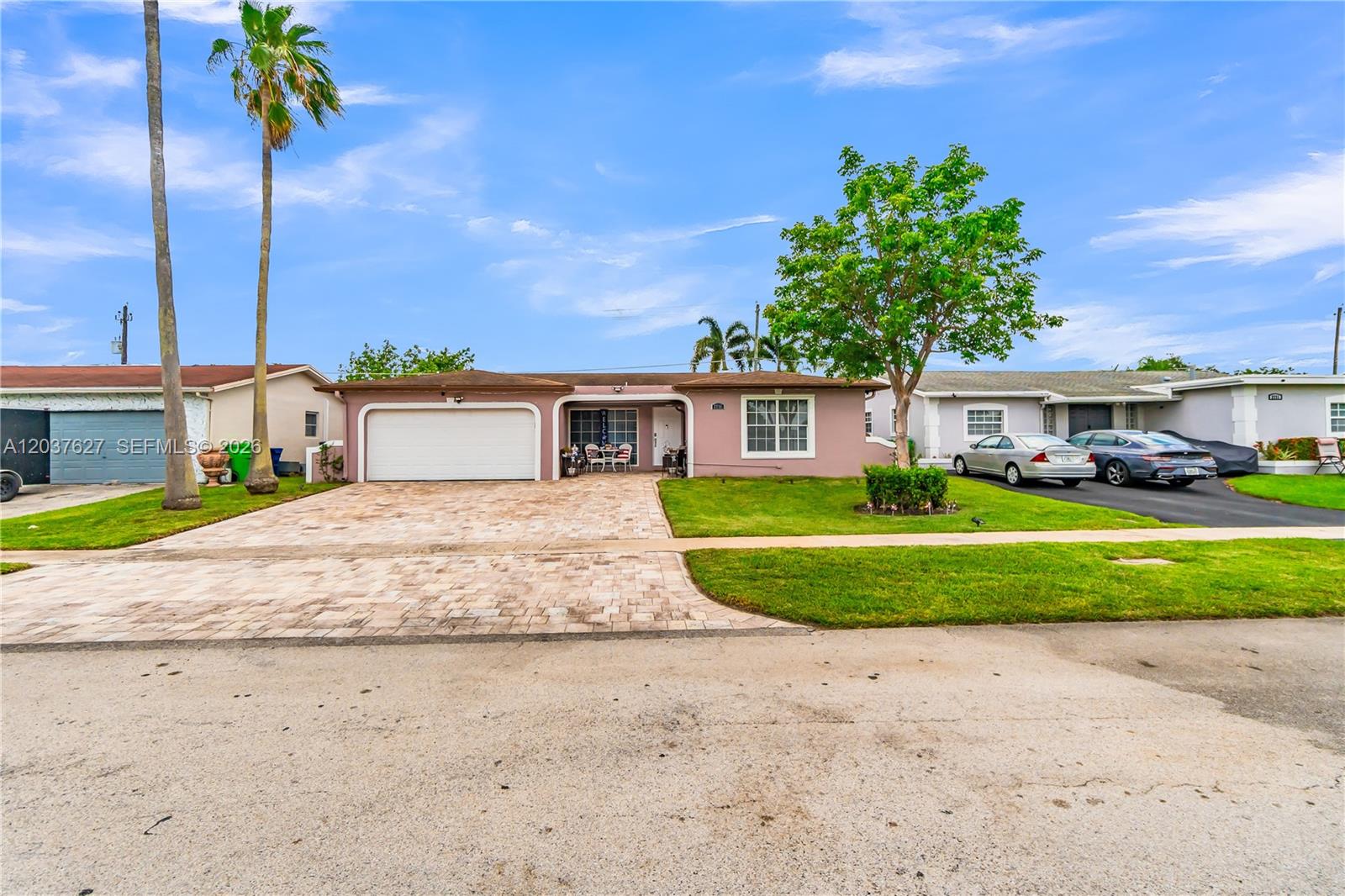 A single-story house with a paved driveway, a garage, and a front lawn — 2751 NW 107th Ter, Sunrise FL 33322, SUNRISE, FL