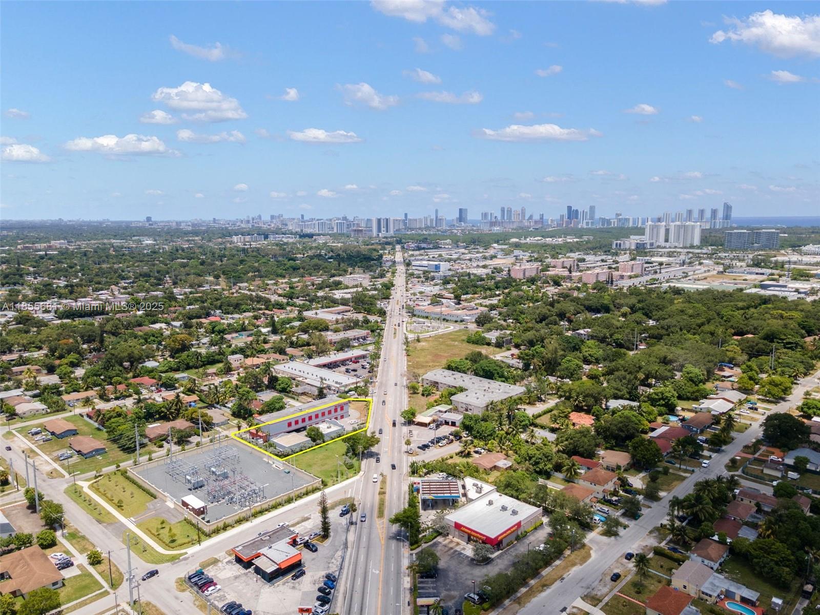 An aerial view shows a commercial building highlighted in yellow next to a power substation — 14444 W Dixie Hwy, Miami FL 33161, MIAMI, FL