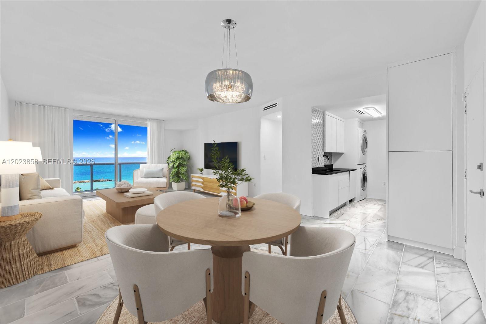 This open-concept living and dining area features white marble floors and a direct ocean view — 10275 Collins Ave # 1035, Bal Harbour FL 33154, BAL HARBOUR, FL