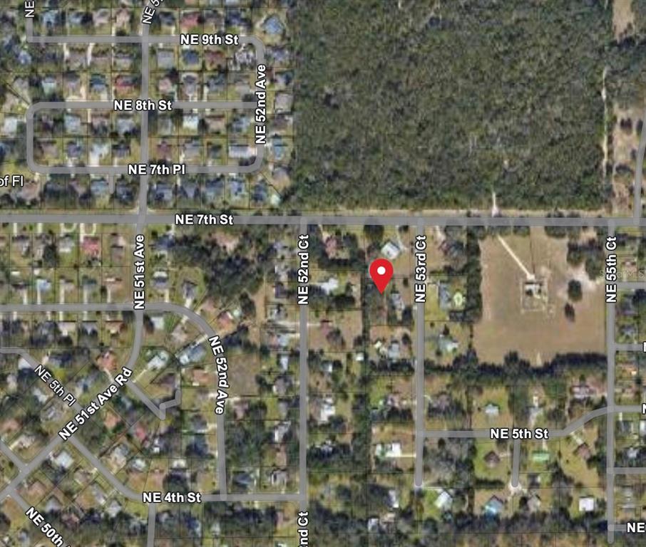 This is an aerial map view showing a residential property marked with a red pin — 600 NE 53RD COURT, OCALA, FL