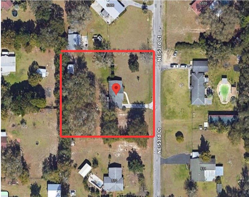 This aerial map view shows a residential property outlined in red on a suburban street — 600 NE 53RD COURT, OCALA, FL
