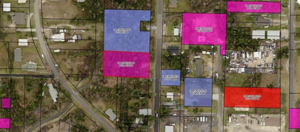 This is a map showing several land parcels highlighted in different colors with transaction data — 135 EVERITT AVENUE, PANAMA CITY, FL