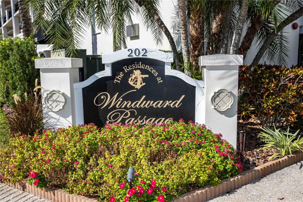 A sign for The Residences at Windward Passage stands in front of a building — 202 WINDWARD PASSAGE UNIT 603, CLEARWATER BEACH, FL
