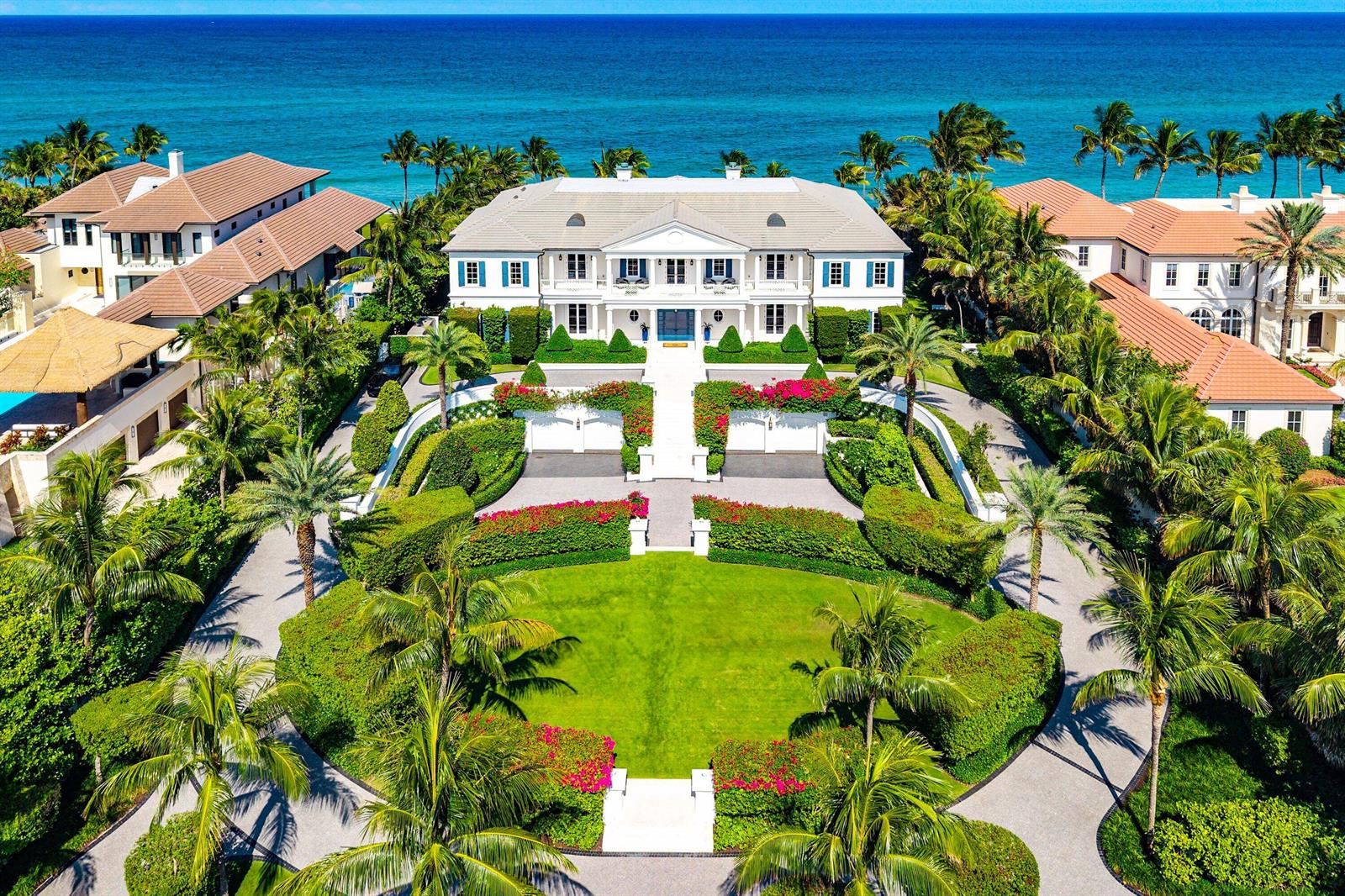 An aerial view of a large white mansion with a circular lawn and landscaped gardens — 640 S Ocean Boulevard, Manalapan FL 33462, MANALAPAN, FL